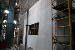Partially-grouted, reinforced concrete masonry wall